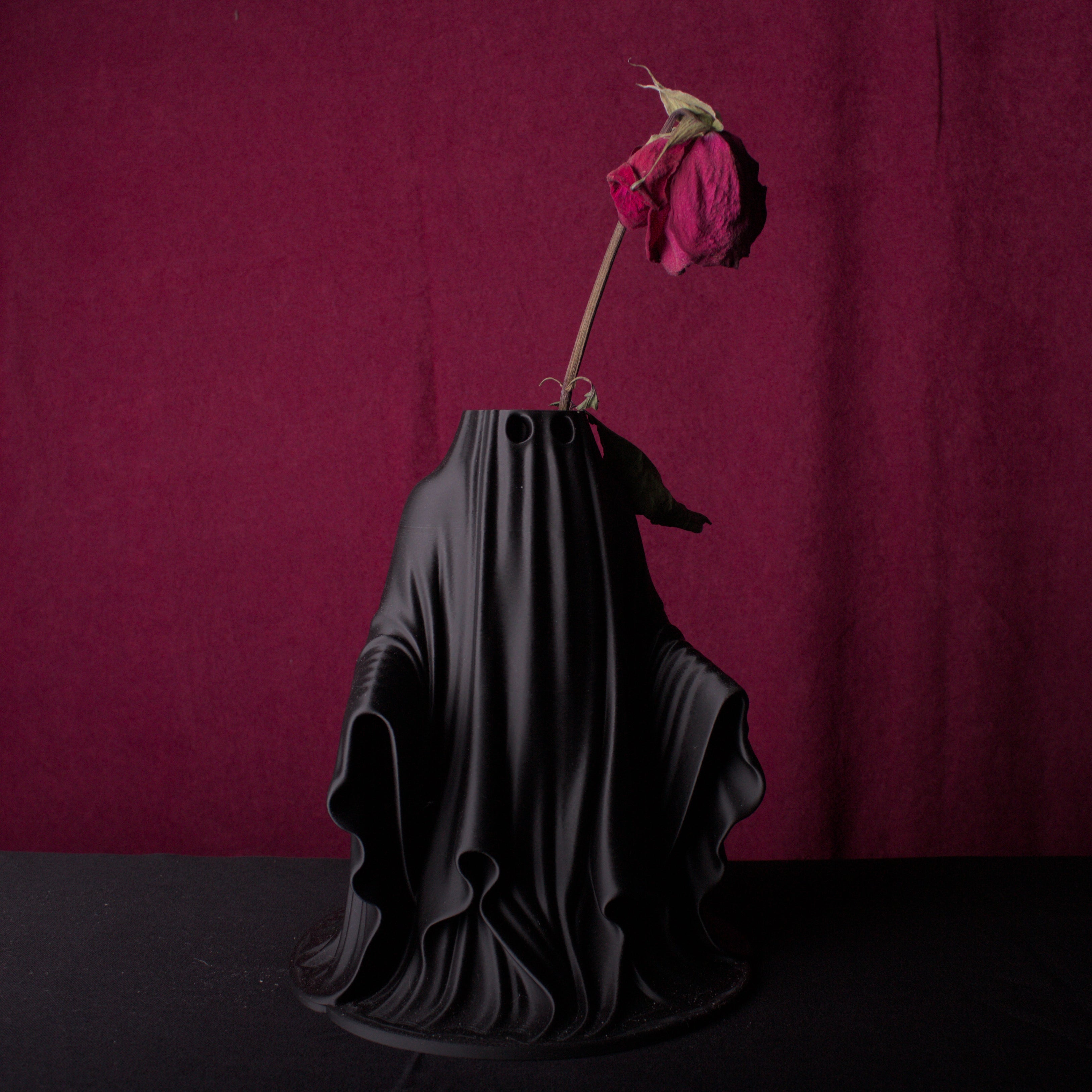 Ghost vase and stylus holder